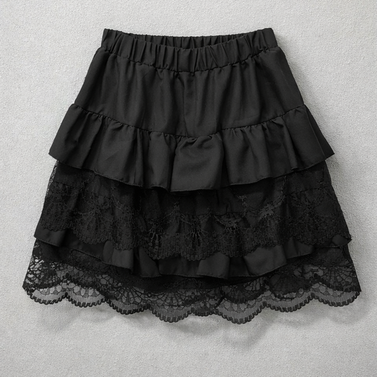 Flat lay of the Frosted Layers Ruffle Skort in black.