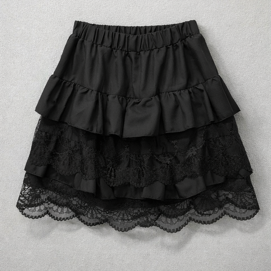 Flat lay of the Frosted Layers Ruffle Skort in black.