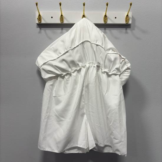 Inside look of the Frosted Layers Ruffle Skort in white, showcasing its built-in shorts.