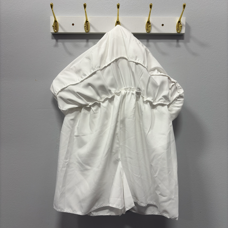 Inside look of the Frosted Layers Ruffle Skort in white, showcasing its built-in shorts.