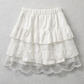 Flat lay of the Frosted Layers Ruffle Skort in white.
