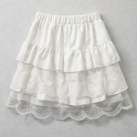 Flat lay of the Frosted Layers Ruffle Skort in white.