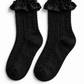 The Innocent Mischief Lace Socks in black with satin ruffle.