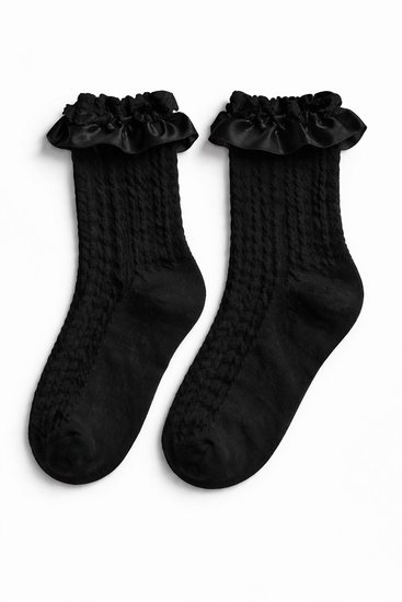 The Innocent Mischief Lace Socks in black with satin ruffle.