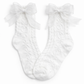 The Innocent Mischief Lace Socks in white with tulle bow.