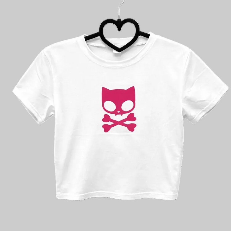 The front of the Meowtal Mayhem Top in white on a black heart hanger