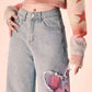 Distressed Pink Butterfly Jeans