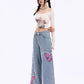 Distressed Pink Butterfly Jeans