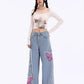 Distressed Pink Butterfly Jeans