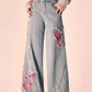 Distressed Pink Butterfly Jeans