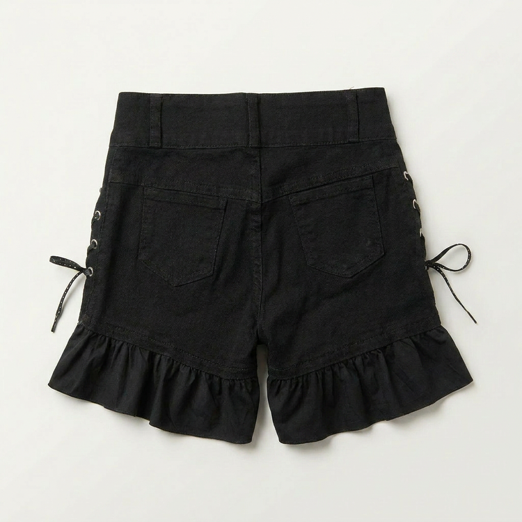 Back view of Two Moody Originals: Pretty Dangerous Shorts featuring custom ruffle hems and black denim construction.