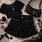 Two Moody Originals: Pretty Dangerous Shorts styled with a lace-trim top, gothic handbag, and silver accessories.