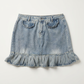 Front flat lay of the Two Moody Originals: Ruffle Flare Jean Skirt in 4XL with ruffle hem and ruffle faux pockets.