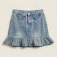 Front flat lay of the Two Moody Originals: Ruffle Flare Jean Skirt in XL with ruffle hem and ruffle faux pockets.