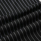 Close-up of Y2K Business Chic Trousers fabric showing crisp white pinstripes on smooth black broadcloth.