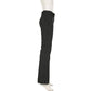 Side profile of Y2K Business Chic Trousers on mannequin, showing diagonal waistband stripes and bootcut flare.