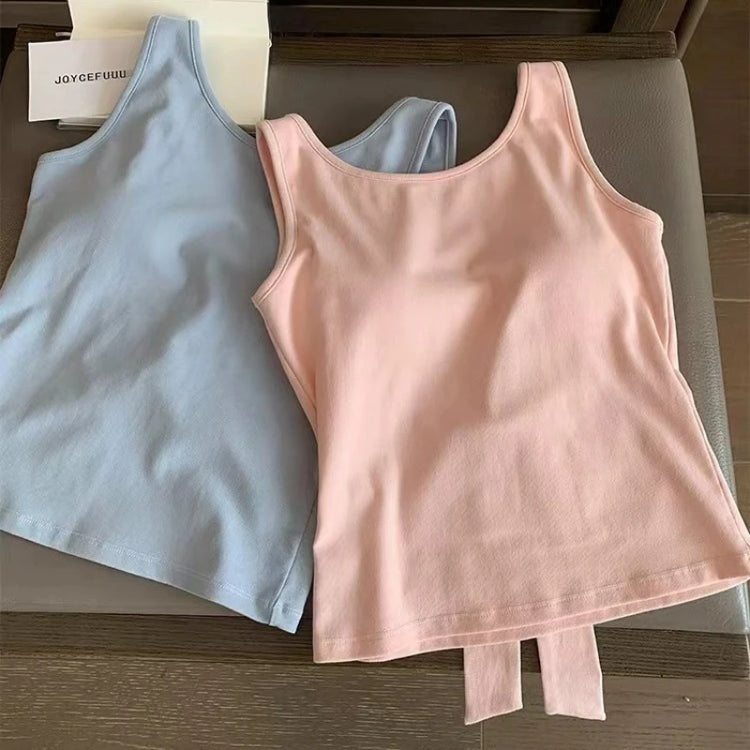 Blue and pink Backstage Bow Backless Tanks laid flat side by side, both displaying the front of the tank.