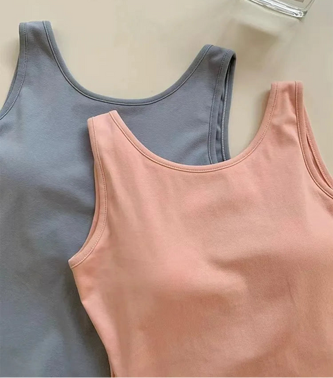 Top front view of the blue and pink Backstage Bow Backless Tanks.