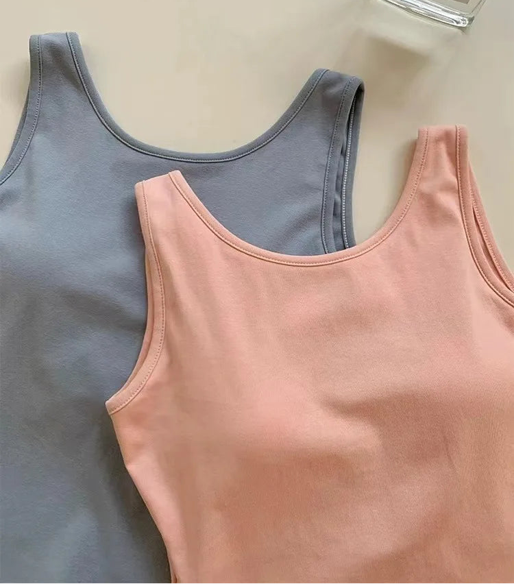 Top front view of the blue and pink Backstage Bow Backless Tanks.