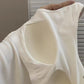 Close-up of the built-in bra cup inside the Backstage Bow Backless Tank