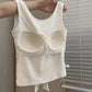Interior view of the built-in bra inside the white Backstage Bow Backless Tank.