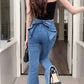 Closer back view of the Dark Blue Backstage Bow Flare Jeans, showcasing the bow detail and hem.