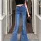 Model wearing the Dark Blue Backstage Bow Flare Jeans, front view.