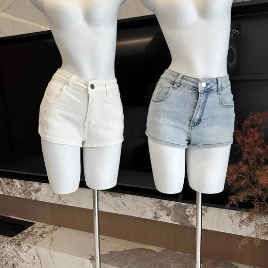 Front view of the white and light blue Backstage Bow Shorts displayed on mannequins.