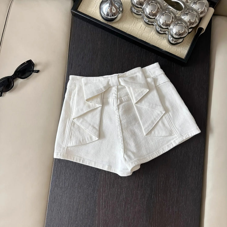 Back view of the white Backstage Bow Shorts.