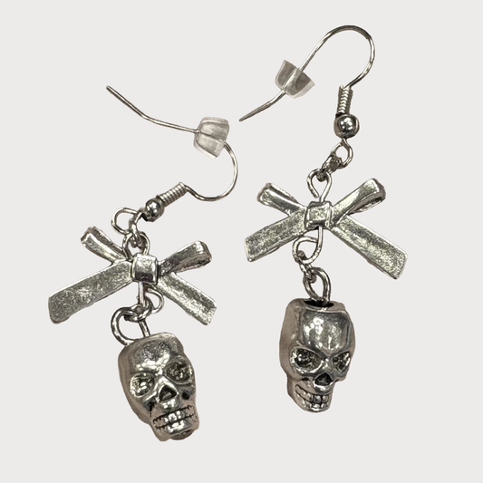 Close-up detail shot of the Bad to the Bow Earrings