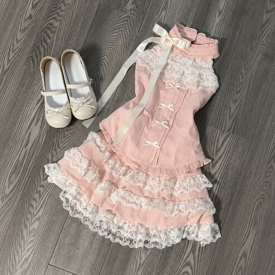 Angled flat lay of the Blushing Belle Skort Set.