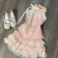 Angled flat lay of the Blushing Belle Skort Set.