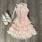 Flat lay of the Blushing Belle Skort Set with matching shoes.