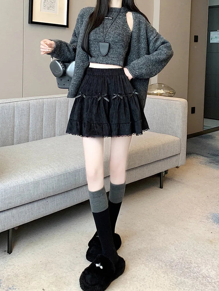 Front view of a model wearing the Bow Peep Mini Skort in Black.