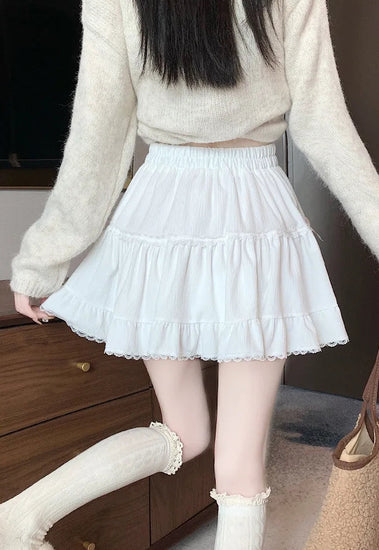 Back view of white Bow Peep Mini Skort, showing its fit and structure.