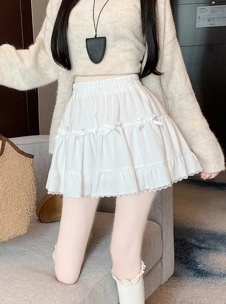 Close-up of Bow Peep Mini Skort in White with lace and bow details.
