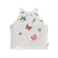 White Charm Collector Tank shown in a front flat lay with colorful butterfly, star, animal, and button embellishments.