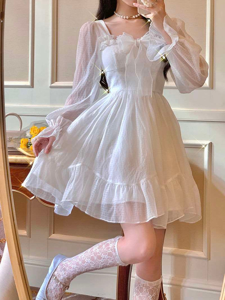 Model posing in the Cloudlight Fairy Dress with added golden sparkles
