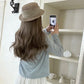 Back view of the Cloudy Daydream Cardigan with relaxed drape.