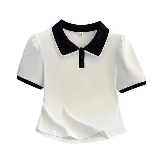 Flat lay of the Collar Me Cute Polo Top in white with black collar, showcasing its contrast collar and lace trim