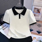 Front view of the Collar Me Cute Polo Top in white with black collar