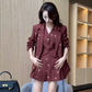 Model wearing the dark red version of the Colorful Butterfly Dreams Embroidered Suit in a tailored indoor setting