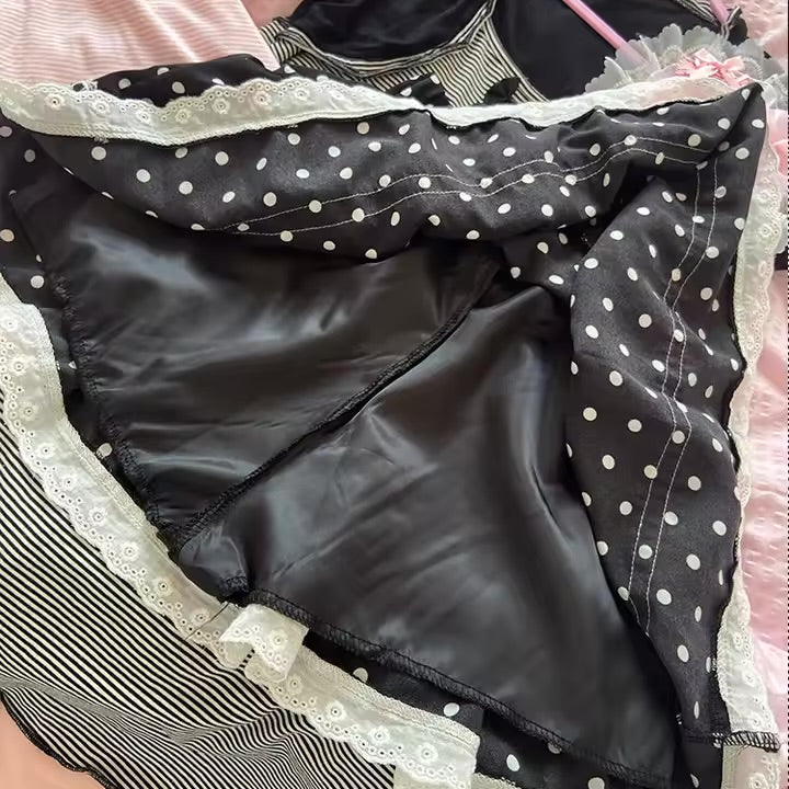Inside view of the Dotted Doll Lace Skort showing its smooth black built-in shorts beneath the polka-dot and lace layers.