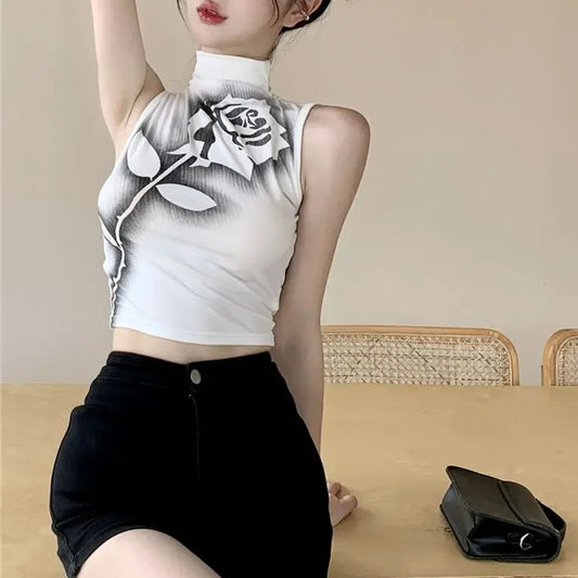 Model wearing Negative Rose Turtleneck Tank in white styled with black skirt