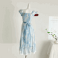 The back of the midi Ethereal Flower Princess Dress on a mannequin.