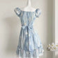 The back of the mini Ethereal Flower Princess Dress on a white mannequin.