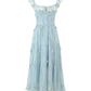 Flat lay of the Ethereal Flower Princess Heavenly Bloom Midi Dress in light blue. 