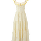 Flat lay of the Ethereal Flower Princess Heavenly Bloom Midi Dress in light yellow. 