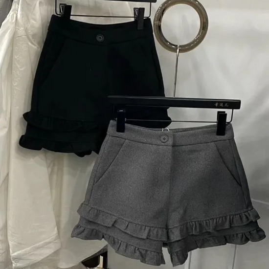 Frill Rush Layered Shorts displayed on hanger highlighting thicker winter-ready fabric