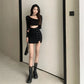 Full view of a model wearing the Laced With Attitude Mini Skort in black
